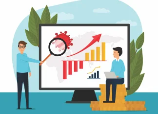 People analyzing business growth on a screen with charts and upward trends