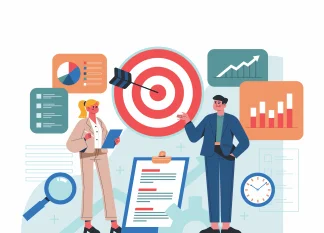 People analyzing data and targeting business goals with charts and graphs